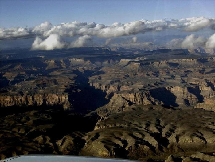 Every time I fly over or near the Grand Canyon, its appearance is different from times before.  Differing light and weather have dramatic impact on the colors, depth, shadows, etc.